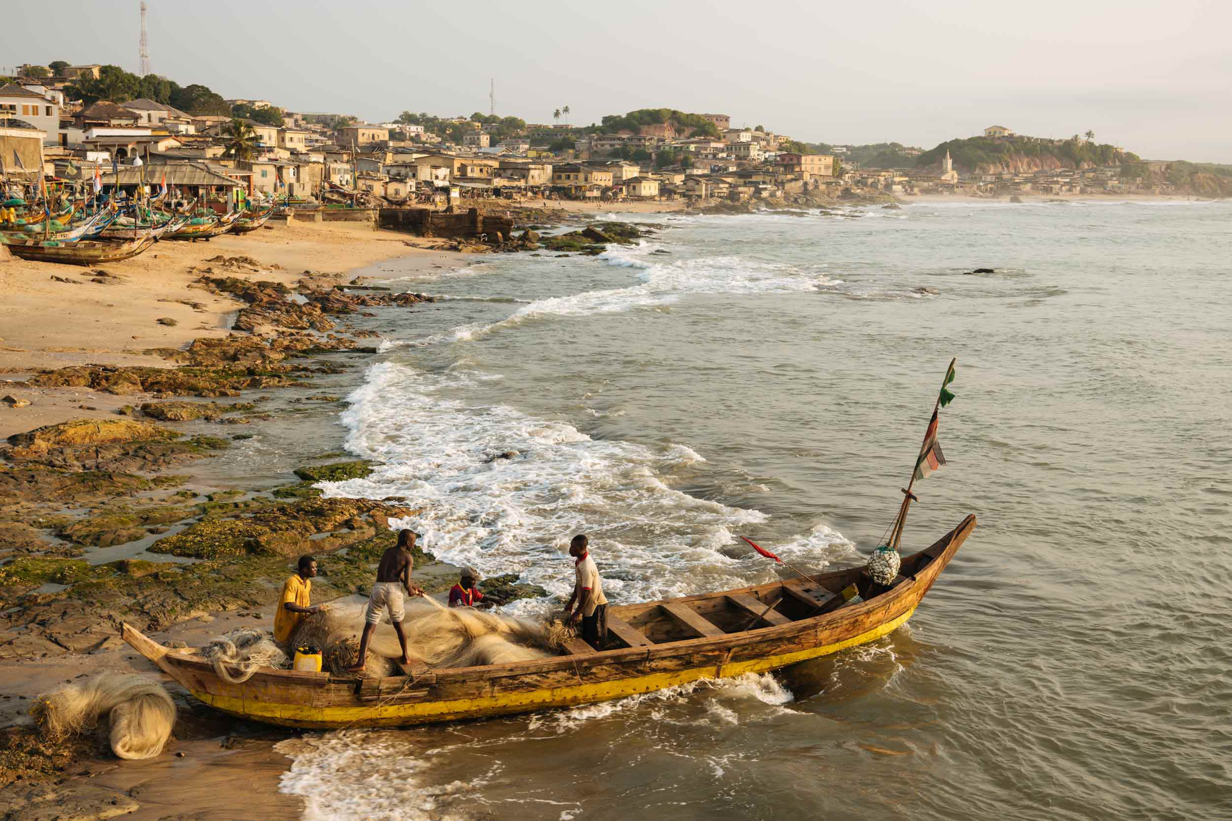 fishing-boats-shore-cape-coast-ghana-africa