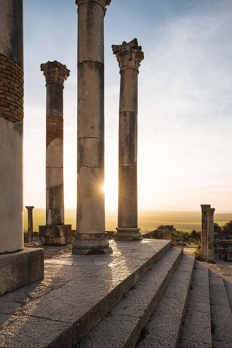 roman-ruins-architecture-columns-volubilis-sunset-travel-meknes-morocco-africa