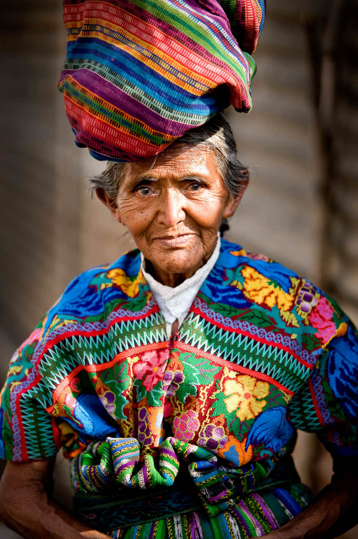 https://2abe47a55cfe3c2aba27-1868d38b8806f9b6ecce0a5b84ee61c5.ssl.cf1.rackcdn.com/san-antonio-aguas-calientes-portrait-colour-traditional-dress-antigua-guatemala-central-america.jpg