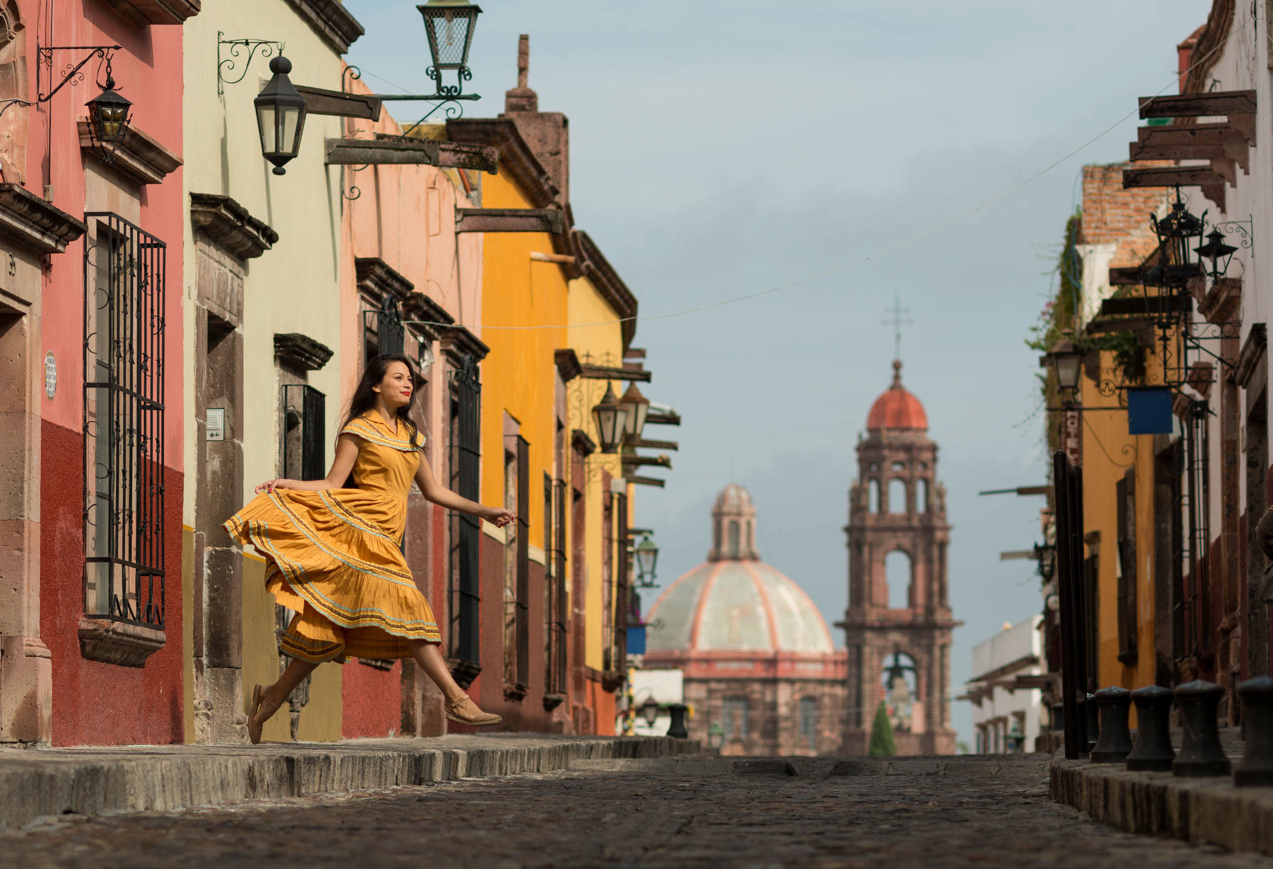 woman-dancing-street-san-miguel-de-allende-guanajuato-mexico