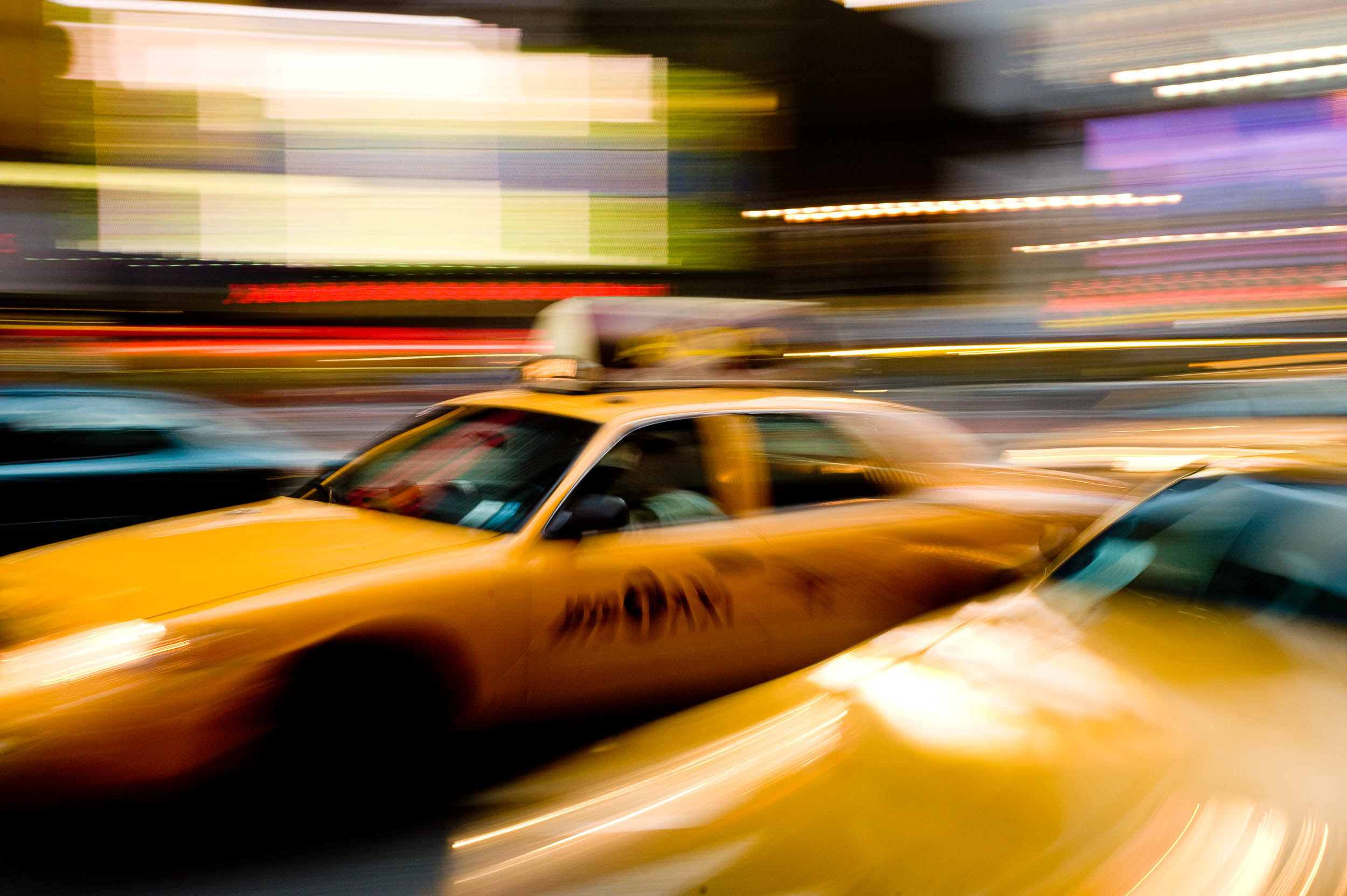 yellow-taxi-cab-car-blur-motion-movement-rush-times-square-travel-manhattan-new-york-city-usa-america